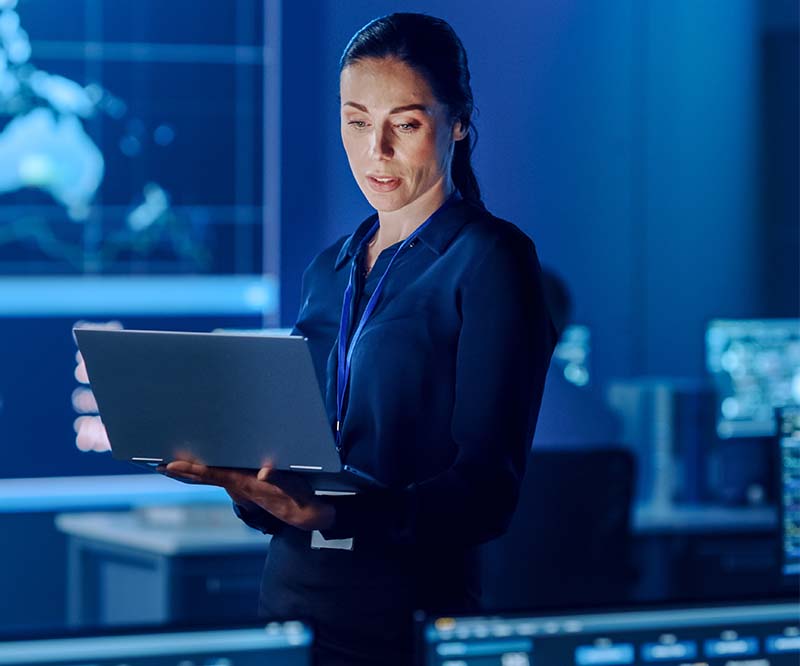 Woman reading from a notebook